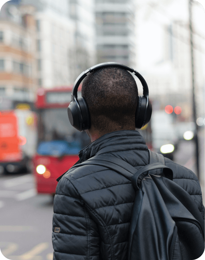 A person commuting whilst listening to blinks on Blinkist